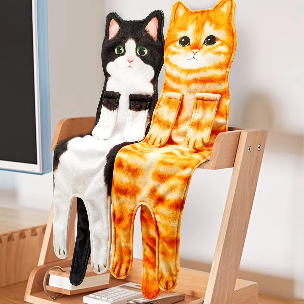 Two cat towels draped over the back of a wooden chair